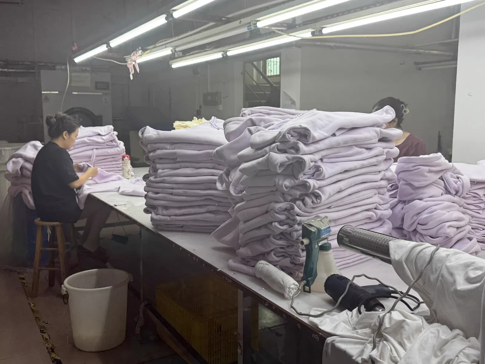 Garment finishing and quality inspection of custom hoodies